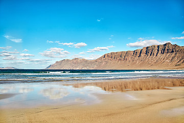 Image showing Landscape with volcanic hills and atlantic ocean in Lanzarote 