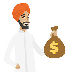 Image showing Hindu businessman holding a money bag.