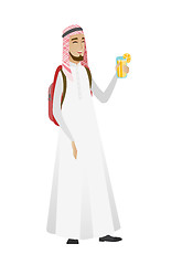 Image showing Young muslim traveler man drinking cocktail.