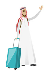 Image showing Young muslim traveler waving his hand.