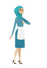 Image showing Disappointed young muslim cleaner with thumb down.