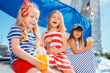 Image showing The children on board of sea yacht