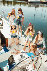 Image showing The children on board of sea yacht