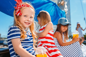 Image showing The children on board of sea yacht