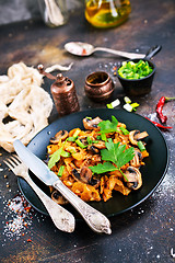 Image showing Fried mushrooms and cabbage