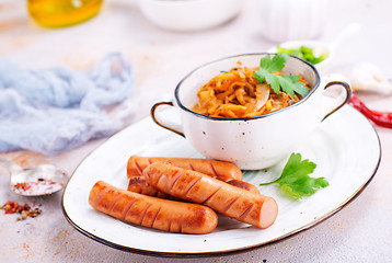 Image showing sausages with cabbage