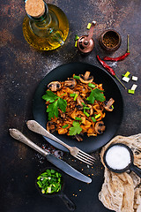 Image showing Fried mushrooms and cabbage