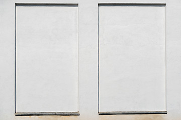 Image showing weathered white stucco wall with a stucco frame