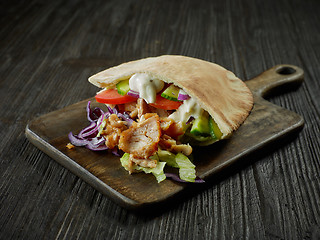 Image showing doner kebab on wooden table