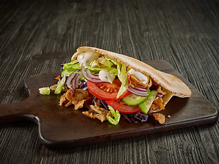 Image showing doner kebab on wooden table