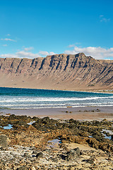 Image showing Landscape with volcanic hills and atlantic ocean in Lanzarote 