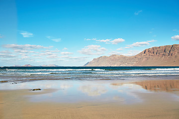 Image showing Landscape with volcanic hills and atlantic ocean in Lanzarote 