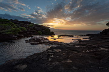 Image showing Sunrise and views over the cliffs at Curracurong creek and falls