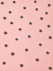 Image showing blueberries on pink background