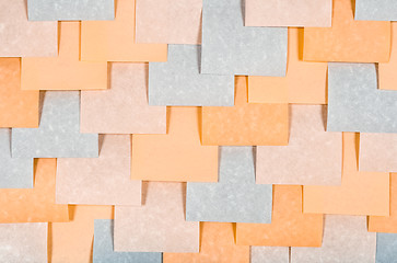 Image showing Gray and peach colored blank notes