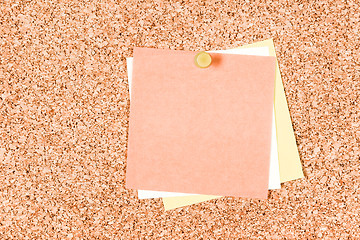 Image showing Blank post-it notes on a corkboard