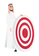 Image showing Young muslim businessman and dart board.