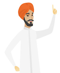 Image showing Hindu businessman pointing his forefinger up.