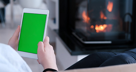 Image showing woman on sofa using tablet computer