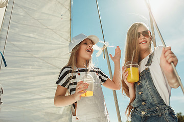 Image showing The children on board of sea yacht