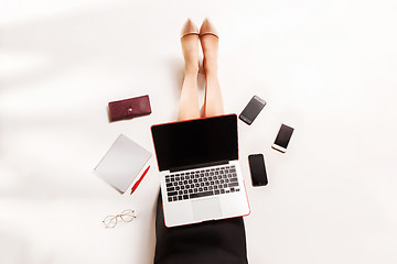 Image showing Fashion blogger writing on laptop computer