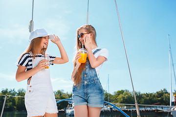 Image showing The children on board of sea yacht