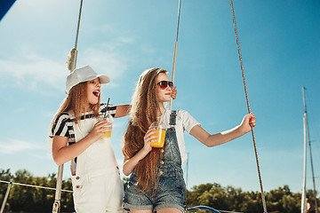 Image showing The children on board of sea yacht