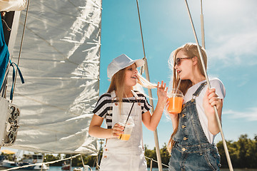 Image showing The children on board of sea yacht