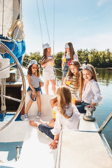 Image showing The children on board of sea yacht