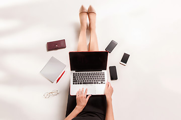 Image showing Fashion blogger writing on laptop computer