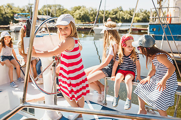 Image showing The children on board of sea yacht