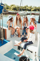 Image showing The children on board of sea yacht