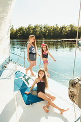 Image showing The children on board of sea yacht