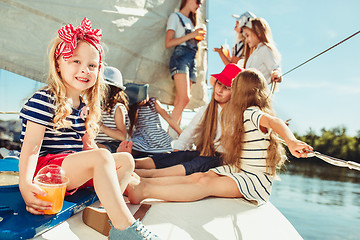 Image showing The children on board of sea yacht