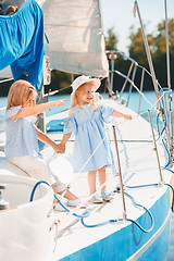 Image showing The children on board of sea yacht