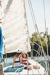 Image showing The children on board of sea yacht