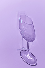 Image showing Wine Glass with shadow on purple background