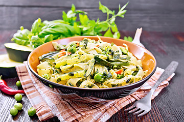 Image showing Tagliatelle with green vegetables on napkin