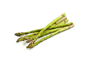 Image showing Bunch of fresh raw garden asparagus isolated on white background