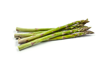 Image showing Bunch of fresh raw garden asparagus isolated on white background