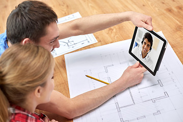 Image showing couple having video call with architect