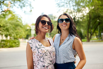 Image showing portrait of happy women or friends at summer park