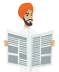 Image showing Hindu businessman reading newspaper.