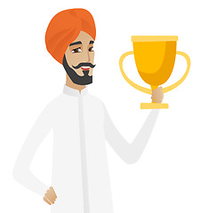 Image showing Hindu businessman holding a trophy.