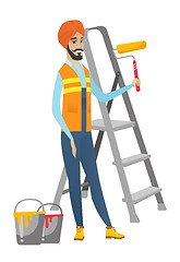 Image showing Hindu house painter holding paint roller.