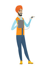 Image showing Young hindu electrician with electrical equipment.