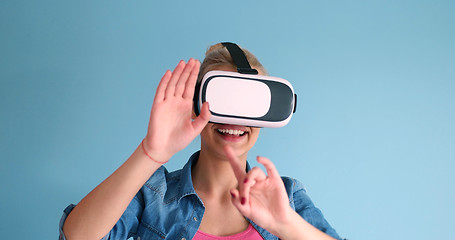 Image showing woman using VR headset glasses of virtual reality