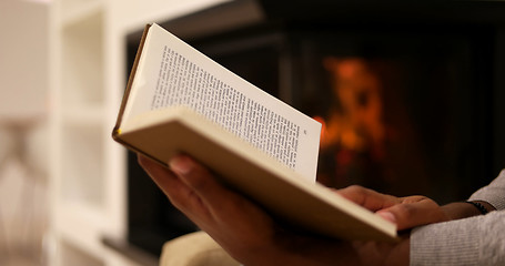 Image showing black woman at home reading book