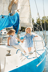 Image showing The children on board of sea yacht