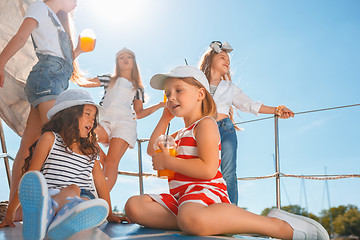 Image showing The children on board of sea yacht